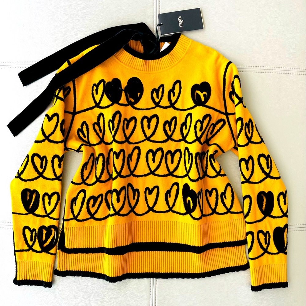 NWT! FENDI
Pullover Heart Scribble Cut-Out Sweater
Size 42 / Medium / US Size 6